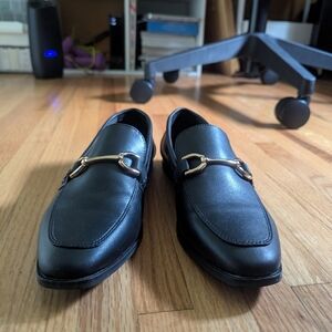 Black Leather Loafers with Gold Detailing